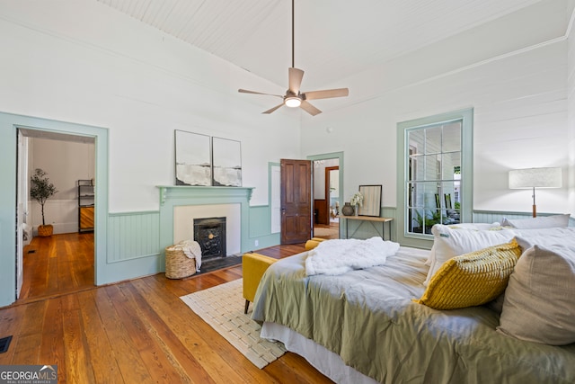 bedroom with hardwood / wood-style flooring and ceiling fan