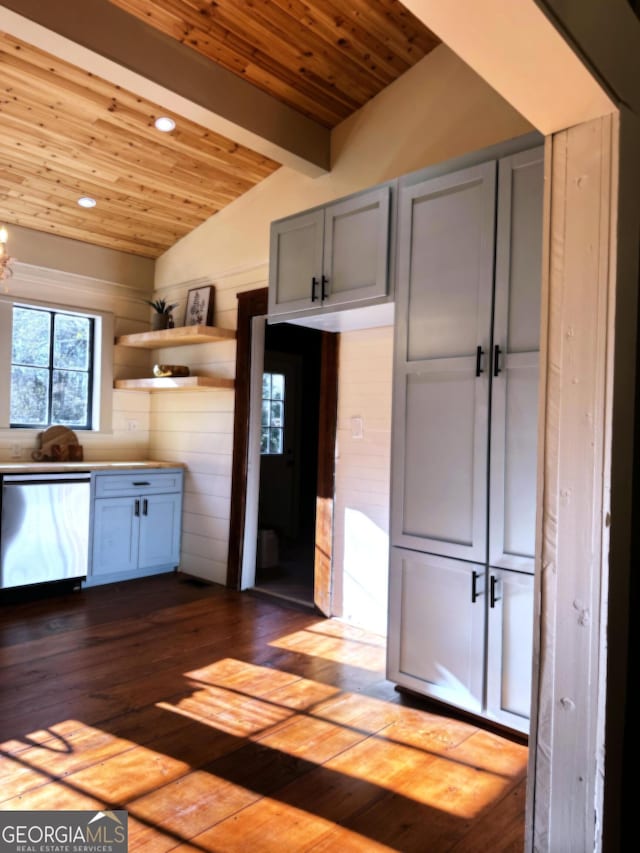 kitchen with white cabinetry, vaulted ceiling with beams, stainless steel dishwasher, light hardwood / wood-style floors, and wood ceiling