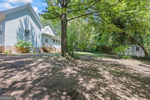 view of yard with a deck