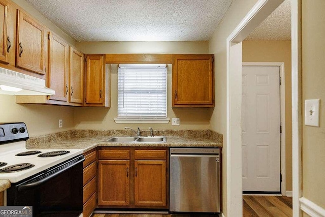 kitchen featuring white electric range oven, a textured ceiling, sink, hardwood / wood-style flooring, and stainless steel dishwasher