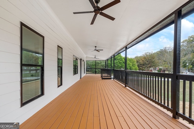 wooden terrace with ceiling fan