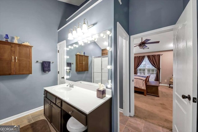 bathroom with walk in shower, high vaulted ceiling, vanity, and ceiling fan