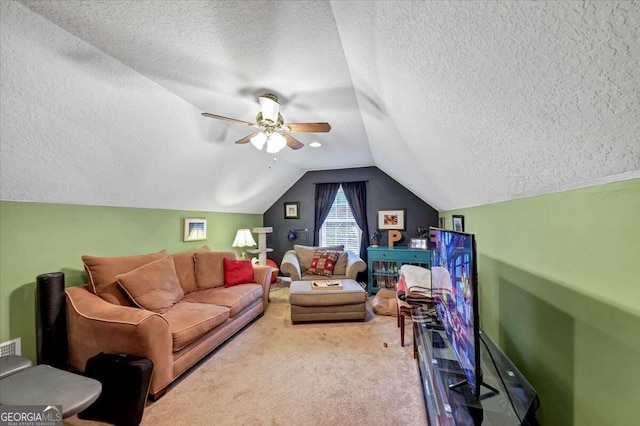 carpeted living room featuring a textured ceiling, vaulted ceiling, and ceiling fan