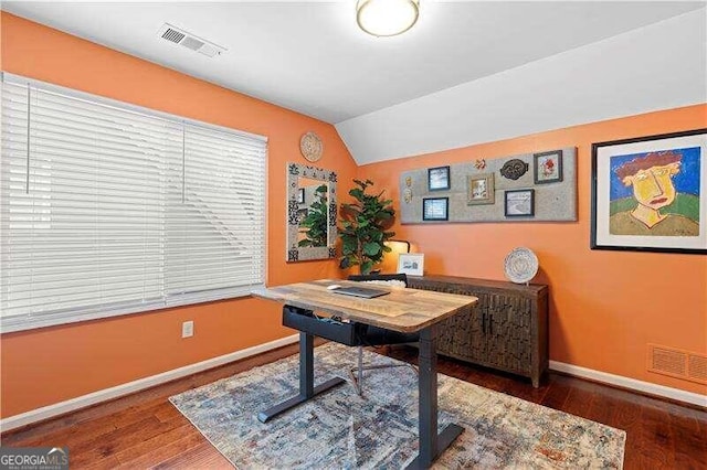 office space with dark hardwood / wood-style flooring and vaulted ceiling