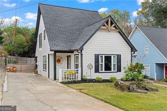 bungalow-style house with a front lawn