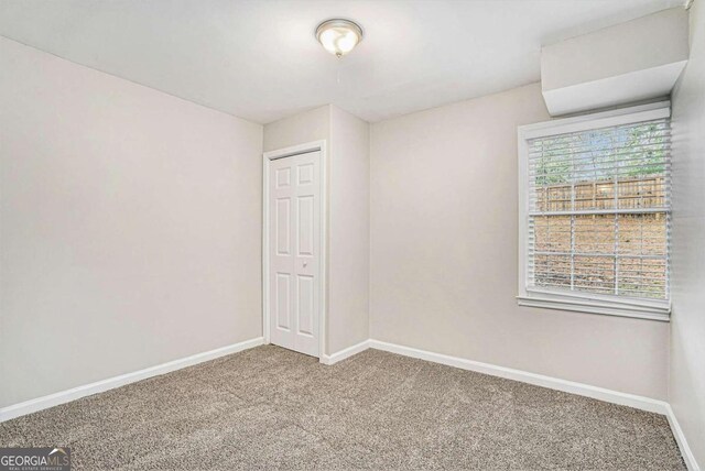 view of carpeted spare room