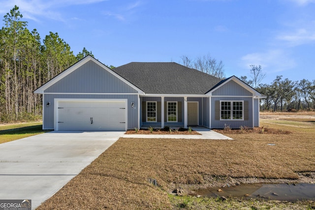 single story home with a garage and a porch