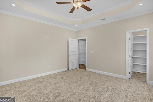 spare room with carpet flooring and ceiling fan