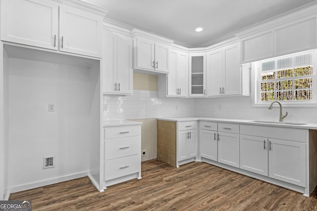 bathroom featuring a bathtub, vanity, and hardwood / wood-style flooring