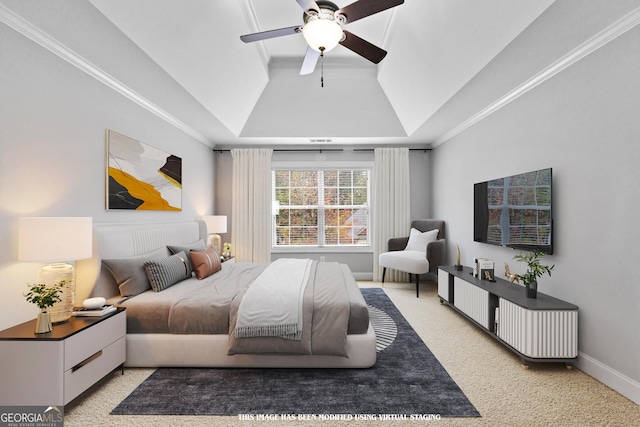 carpeted bedroom with ceiling fan, lofted ceiling, and ornamental molding