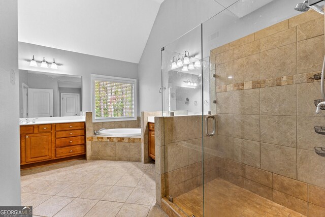 bathroom with separate shower and tub, tile patterned flooring, vanity, and vaulted ceiling