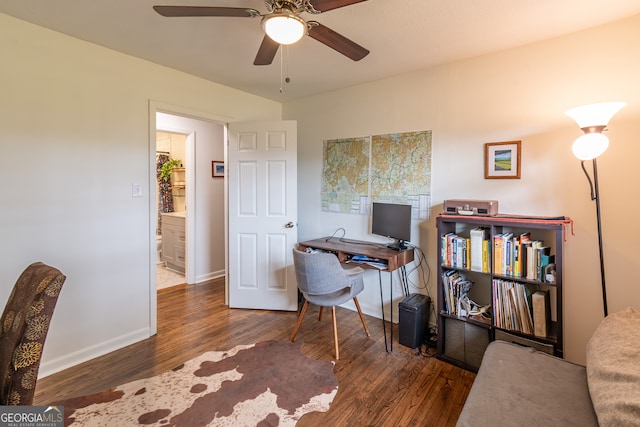 office space with dark hardwood / wood-style floors and ceiling fan