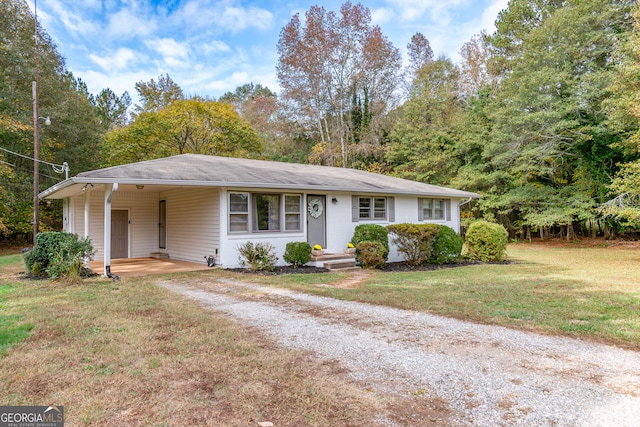 ranch-style house with a front lawn