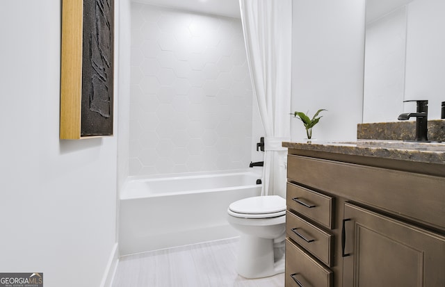 full bathroom with shower / bath combo with shower curtain, vanity, and toilet