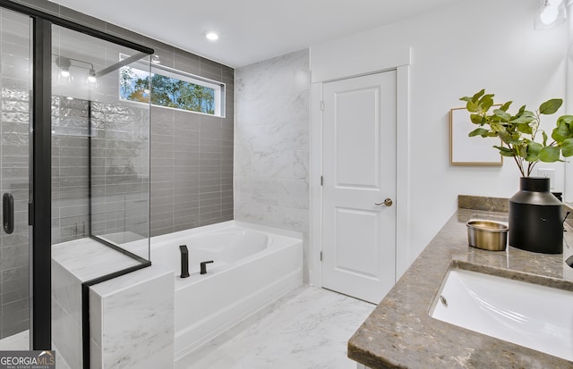 bathroom featuring vanity and plus walk in shower