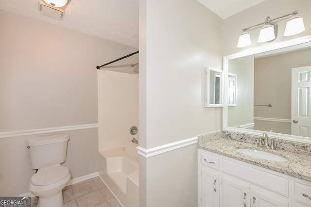 full bathroom with tile patterned flooring, bathing tub / shower combination, a textured ceiling, toilet, and vanity