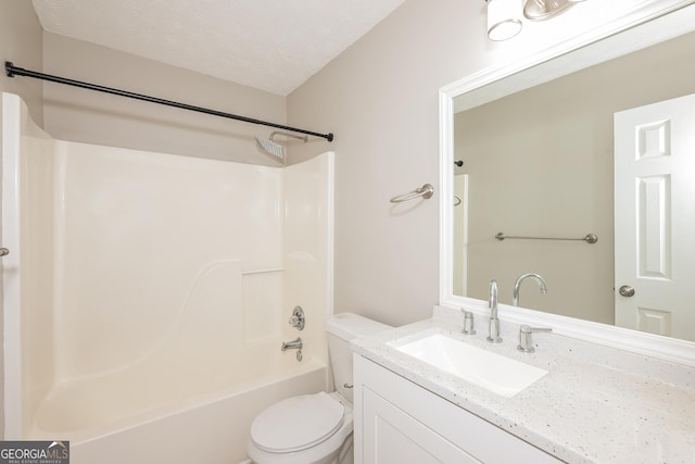 full bathroom featuring shower / tub combination, vanity, a textured ceiling, and toilet