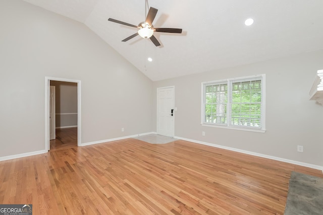 unfurnished living room featuring ceiling fan, high vaulted ceiling, and light hardwood / wood-style floors