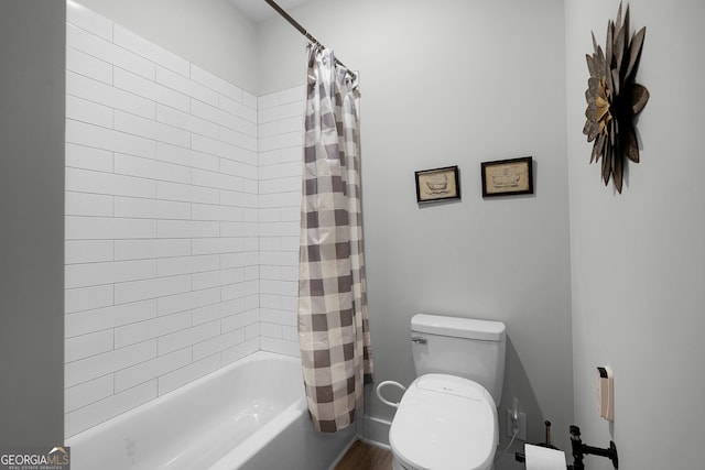 bathroom with toilet and shower / tub combo with curtain