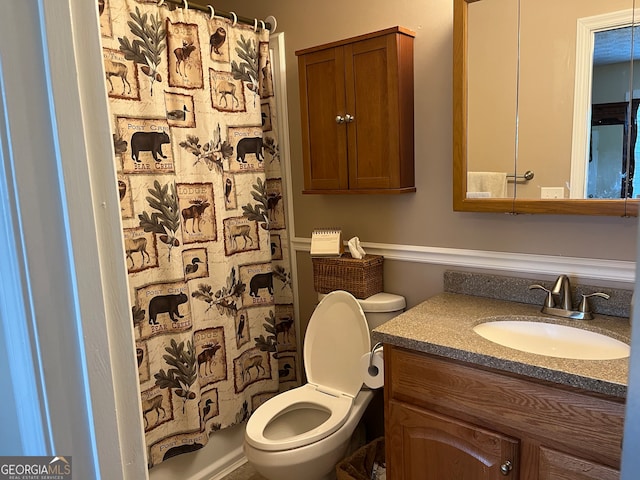 full bathroom with vanity, toilet, and shower / tub combo with curtain