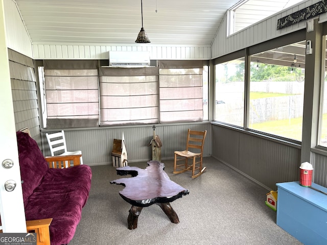 sunroom / solarium with lofted ceiling and a wall mounted air conditioner