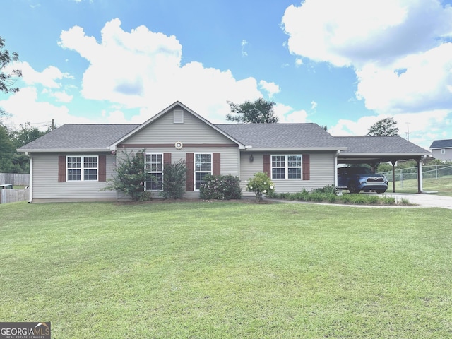 ranch-style house featuring a front lawn and a carport