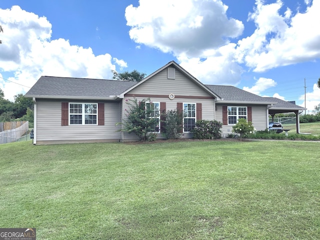 ranch-style house featuring a front yard