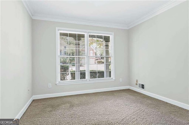 unfurnished room featuring carpet flooring and ornamental molding