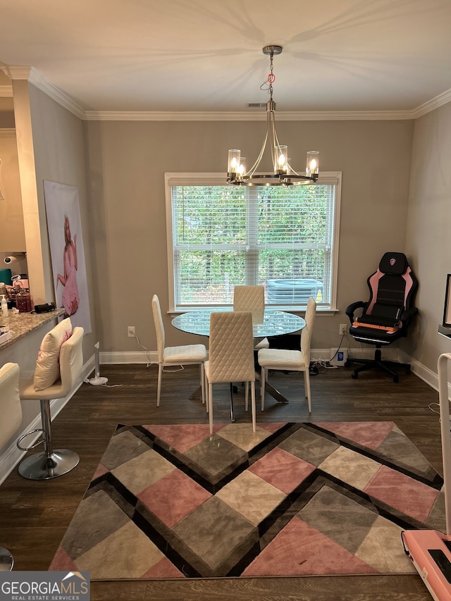 dining area with a healthy amount of sunlight, an inviting chandelier, dark hardwood / wood-style flooring, and crown molding