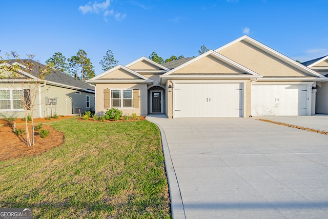 ranch-style home with a garage and a front lawn