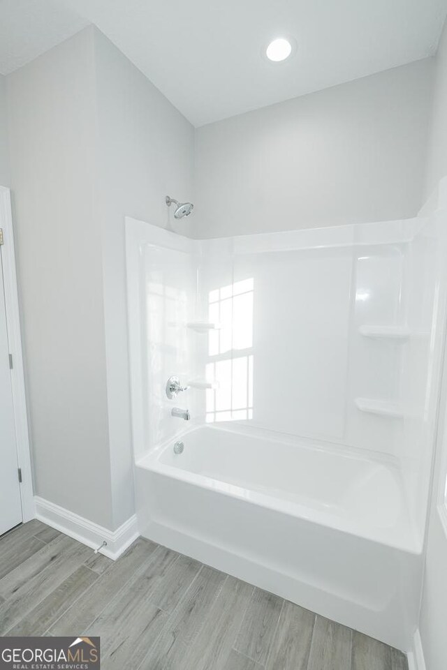 184 The Villas Way, Kingsland, GA 31548 - bathroom featuring hardwood / wood-style floors and bathing tub / shower combination
