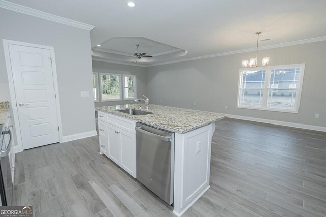 184 The Villas Way, Kingsland, GA 31548 - kitchen featuring dishwasher, white cabinets, sink, an island with sink, and decorative light fixtures