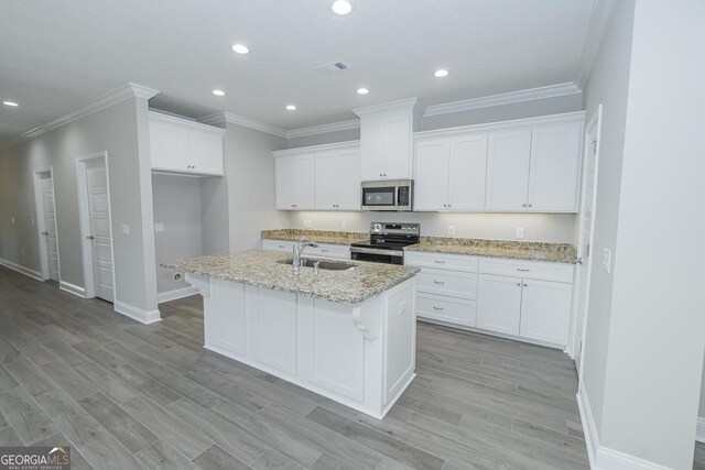 184 The Villas Way, Kingsland, GA 31548 - kitchen featuring white cabinetry, appliances with stainless steel finishes, and sink