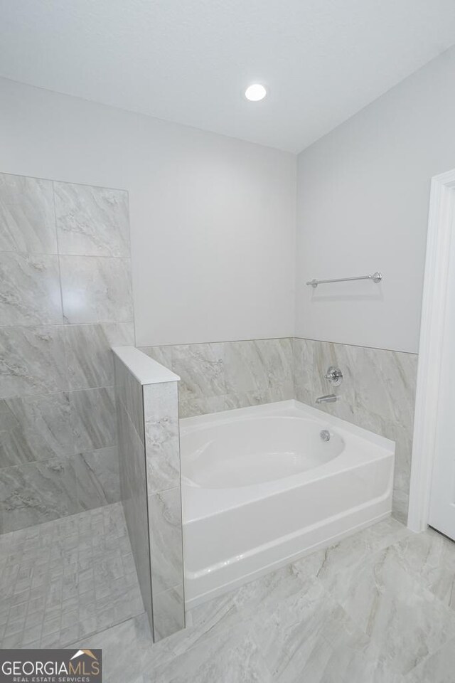 184 The Villas Way, Kingsland, GA 31548 - bathroom with a tub to relax in and tile walls