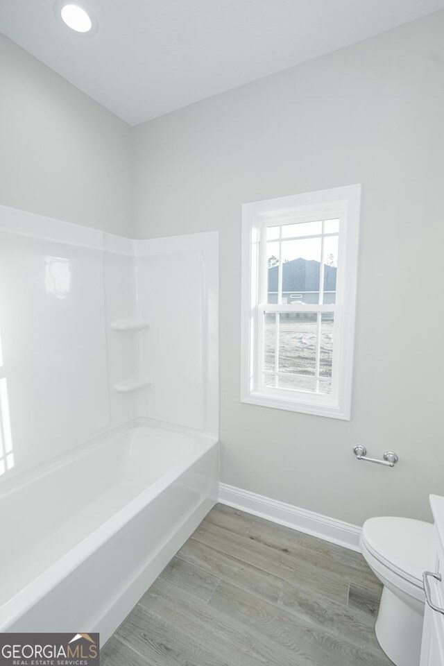 184 The Villas Way, Kingsland, GA 31548 - full bathroom with hardwood / wood-style flooring, vanity, toilet, and shower / bathing tub combination