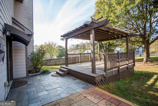 view of patio / terrace with a deck and a pergola