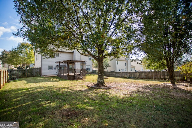 view of yard featuring a wooden deck