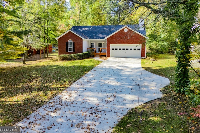 single story home featuring a front yard and a garage