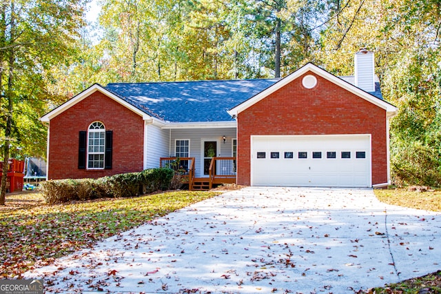 ranch-style home featuring a garage and a porch