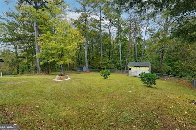 view of yard with a shed