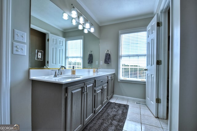 bathroom with tile patterned flooring, vanity, a textured ceiling, and crown molding