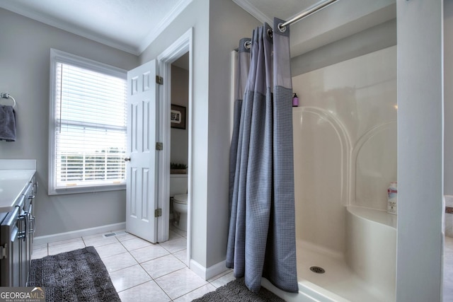 full bath with a shower stall, baseboards, tile patterned flooring, and crown molding