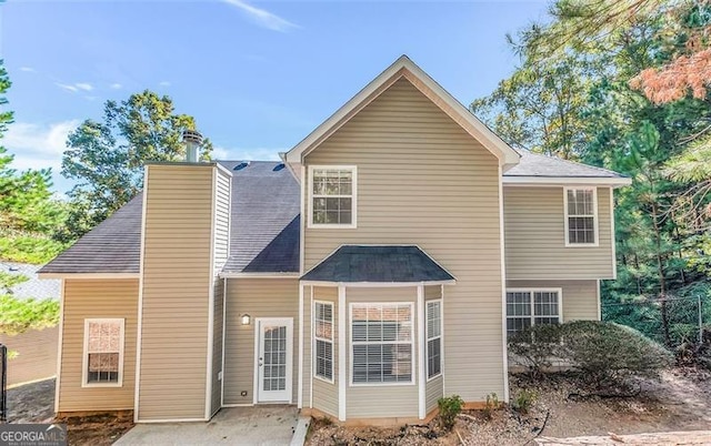 rear view of house with a patio