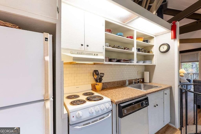 kitchen with sink, exhaust hood, white cabinetry, light hardwood / wood-style flooring, and white appliances