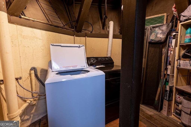 laundry room featuring washer / dryer