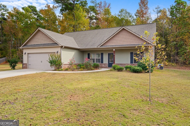 craftsman inspired home with a garage, a front yard, and a porch