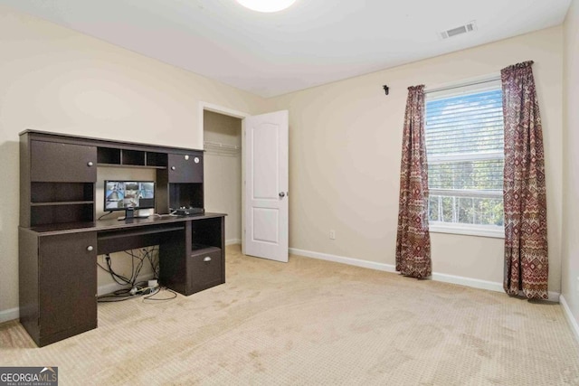 office area with light colored carpet