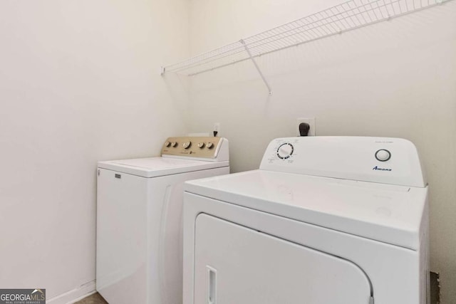 washroom featuring separate washer and dryer