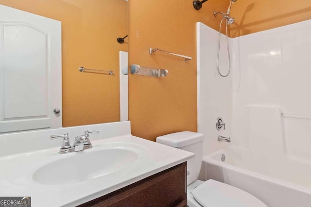 full bathroom featuring vanity, toilet, and bathtub / shower combination