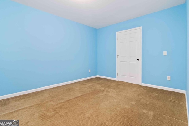 view of carpeted spare room